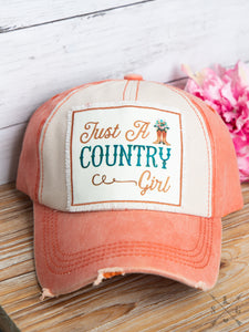 Just a Country Girl Patch on Distressed Orange and Cream Hat