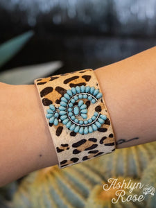 All Wrapped Up Leopard Suede Cuff Button Bracelet With A Turquoise Stone Squash Blossom